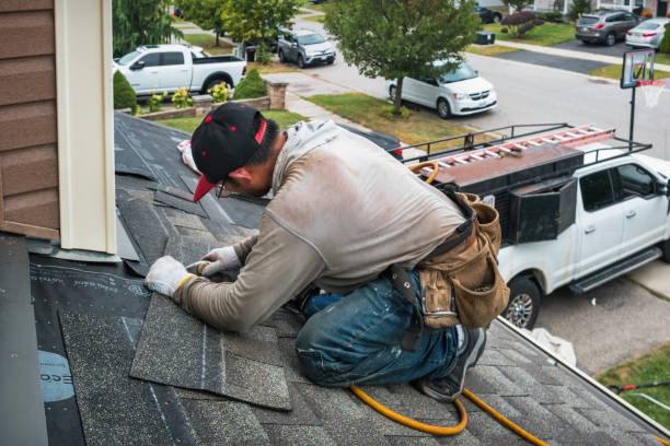 Professional Flat Roof Repair technician working in Denver, IN